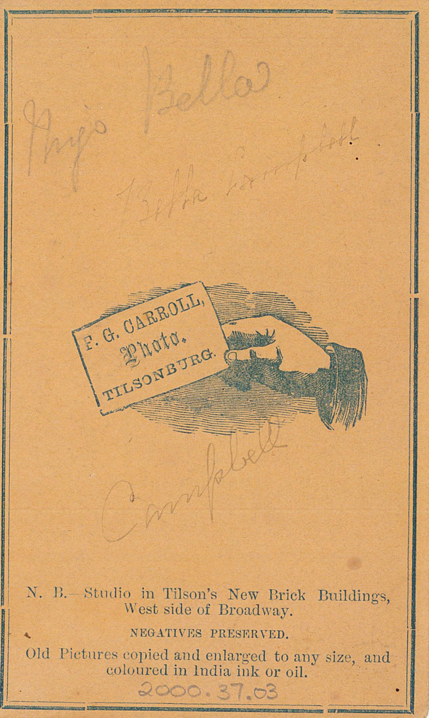 Back of orange cabinet card from F.G. Carroll's photography studio. Feature a sketch of a hand holding a card. 